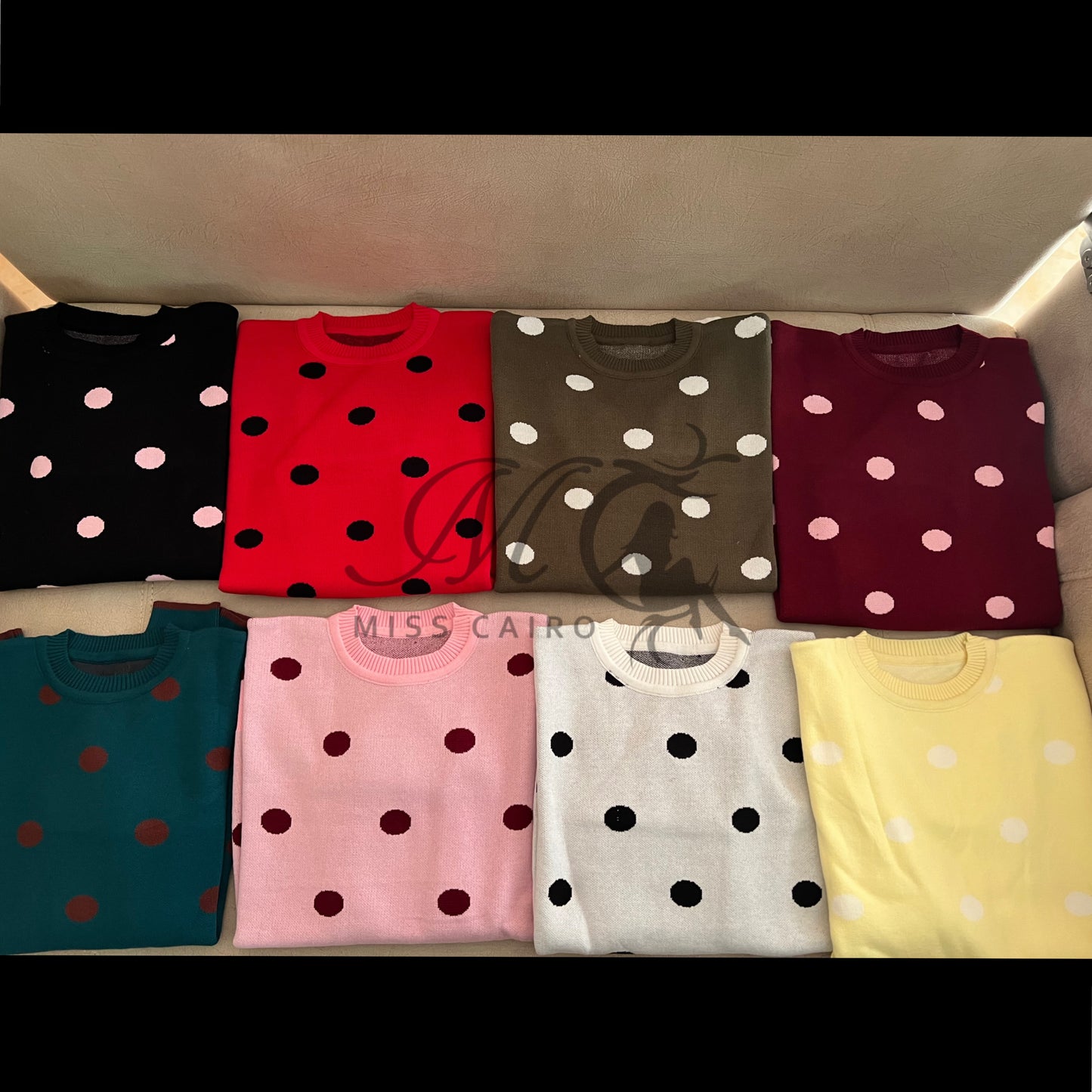 Cozy polka dot knitted sweater.