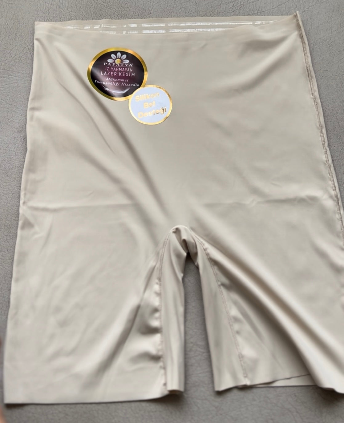 High-waist laser cut short.