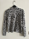 Warm Leopard chic knit blouse.