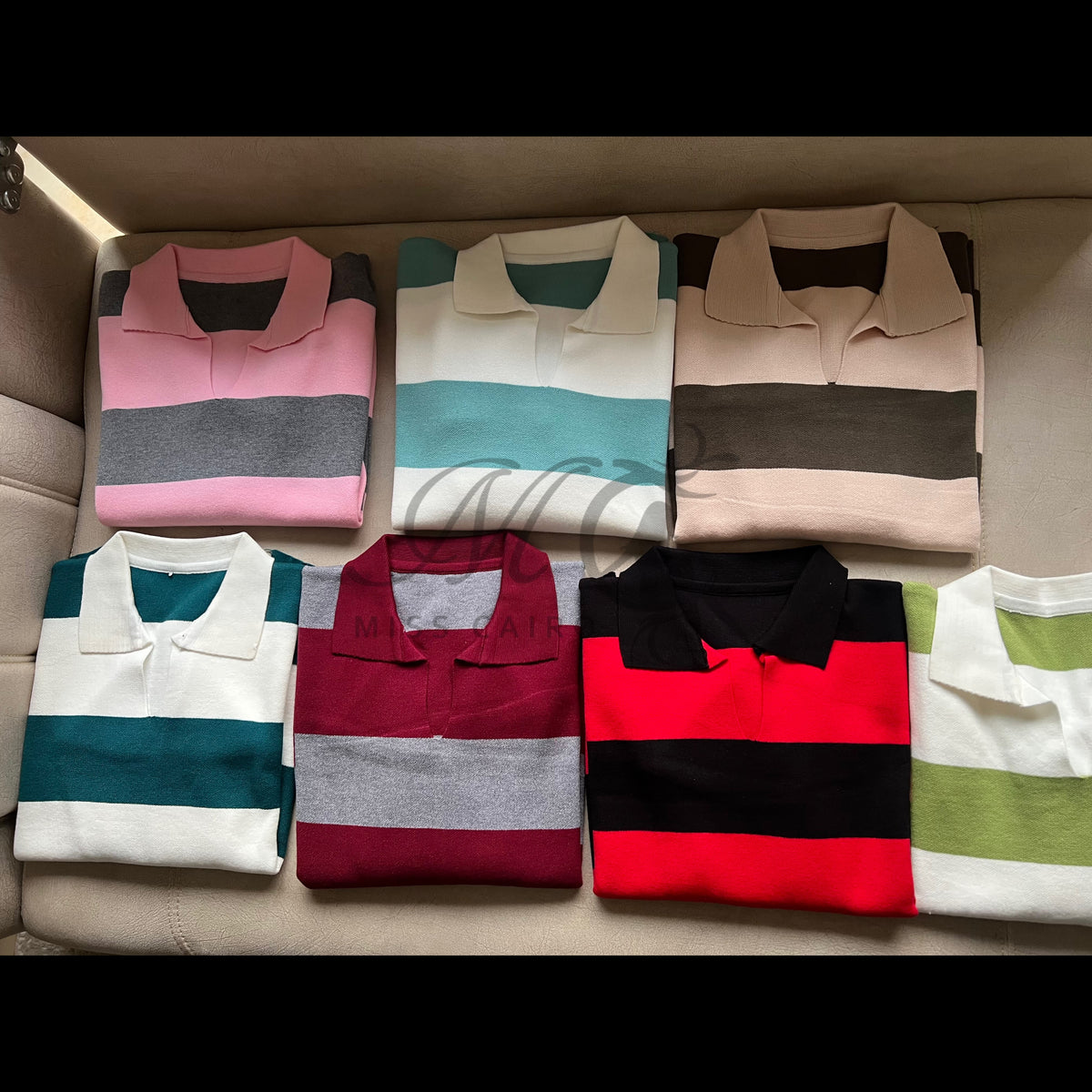 Soft, striped knitted polo jumper.
