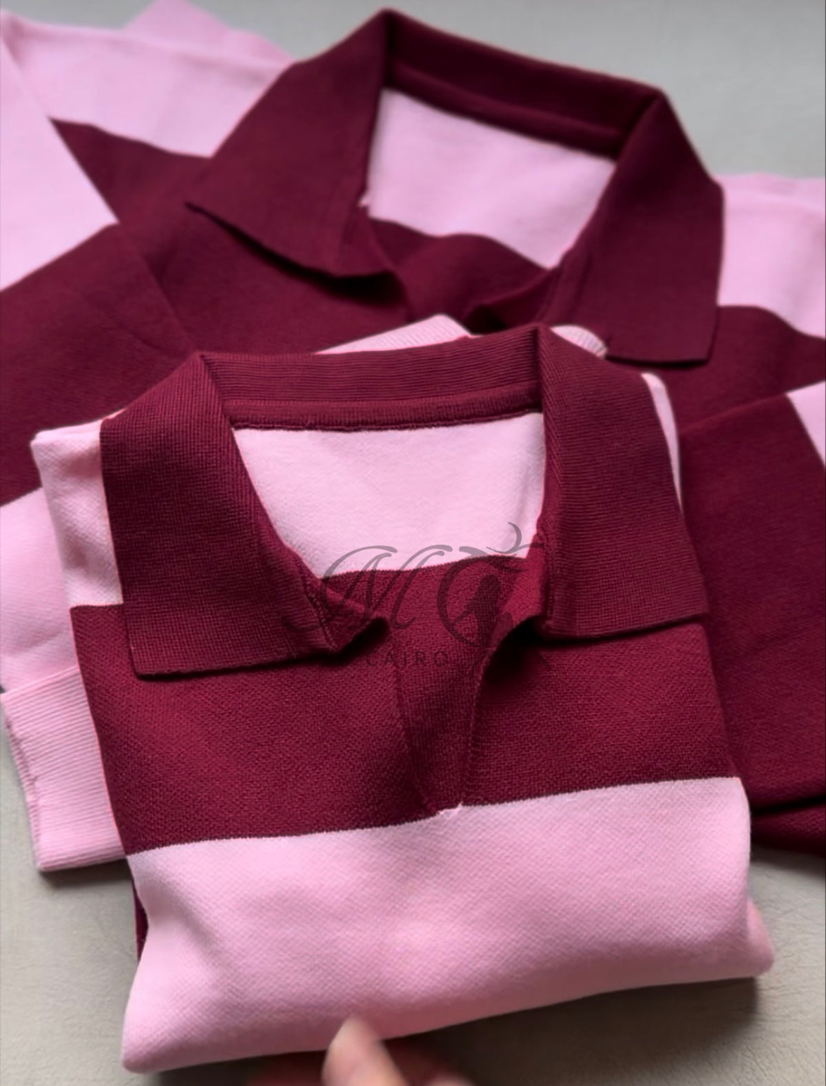 Soft, striped knitted polo jumper.