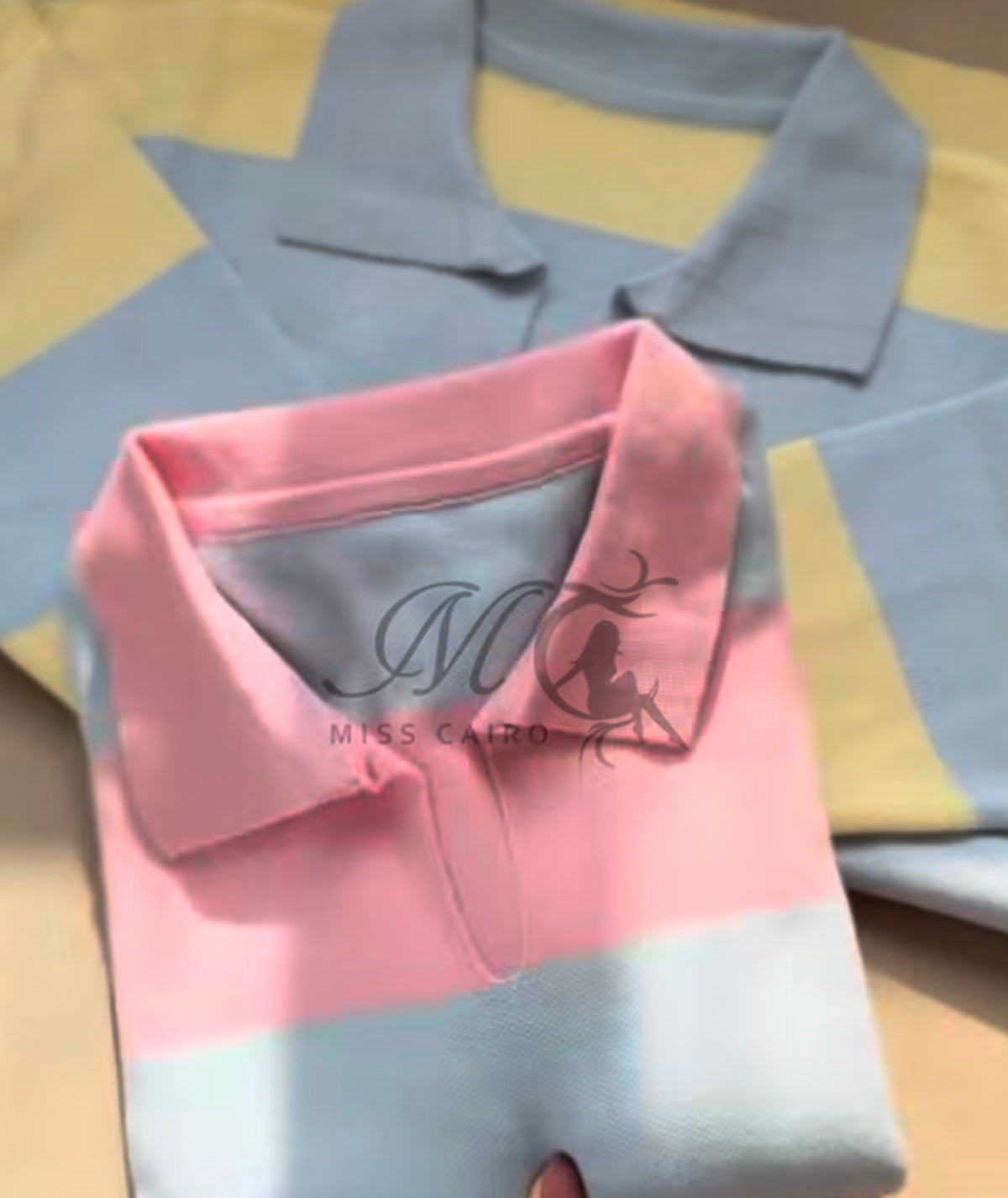 Soft, striped knitted polo jumper.