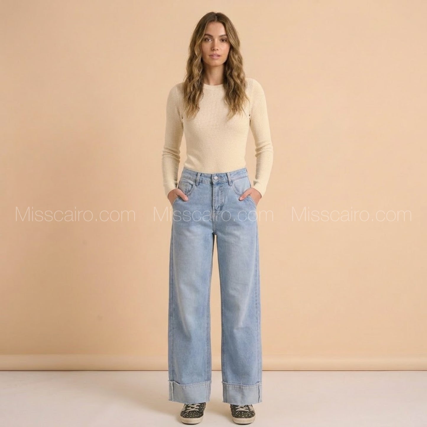 Cuffed wide-leg jeans.