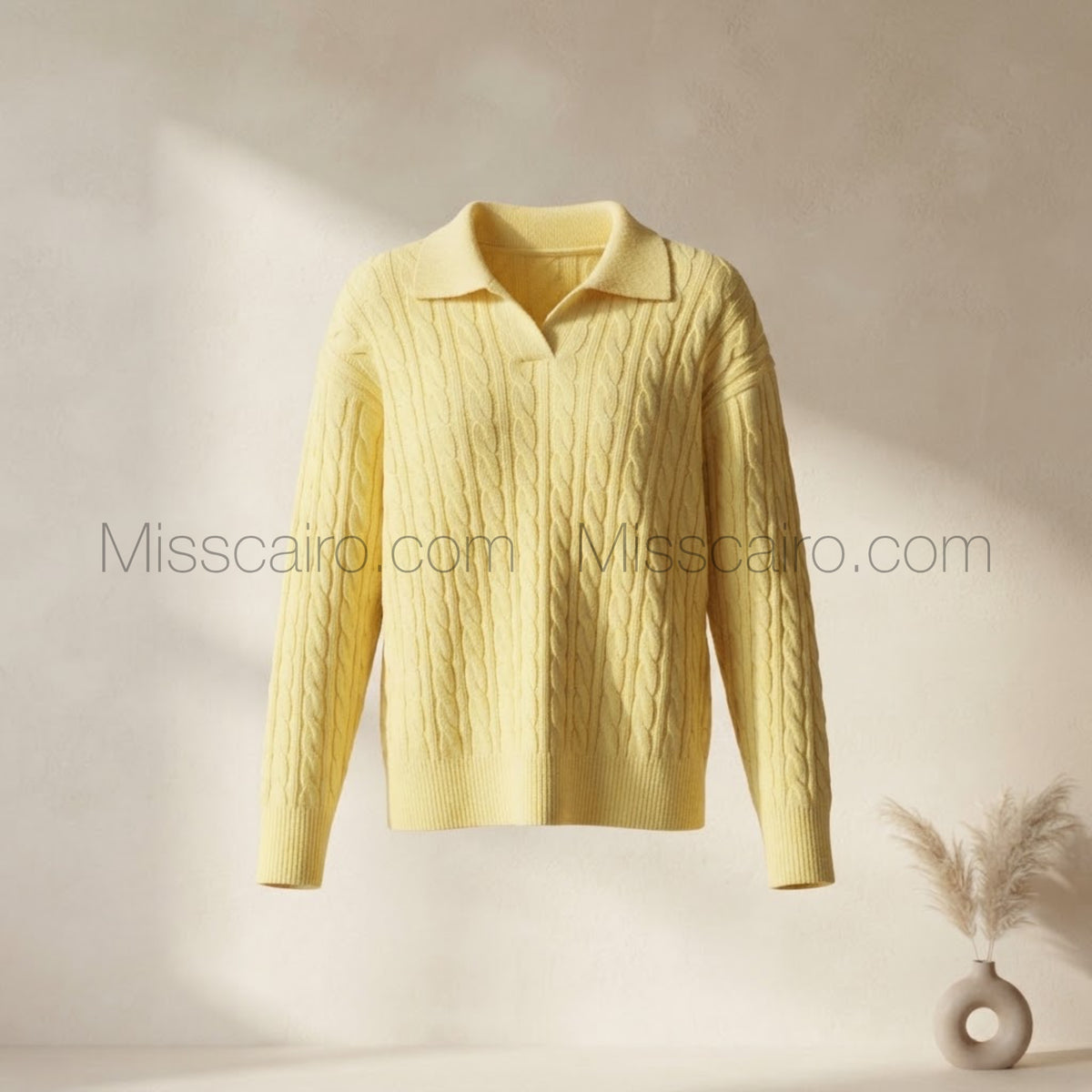 Stylish knit polo sweater.