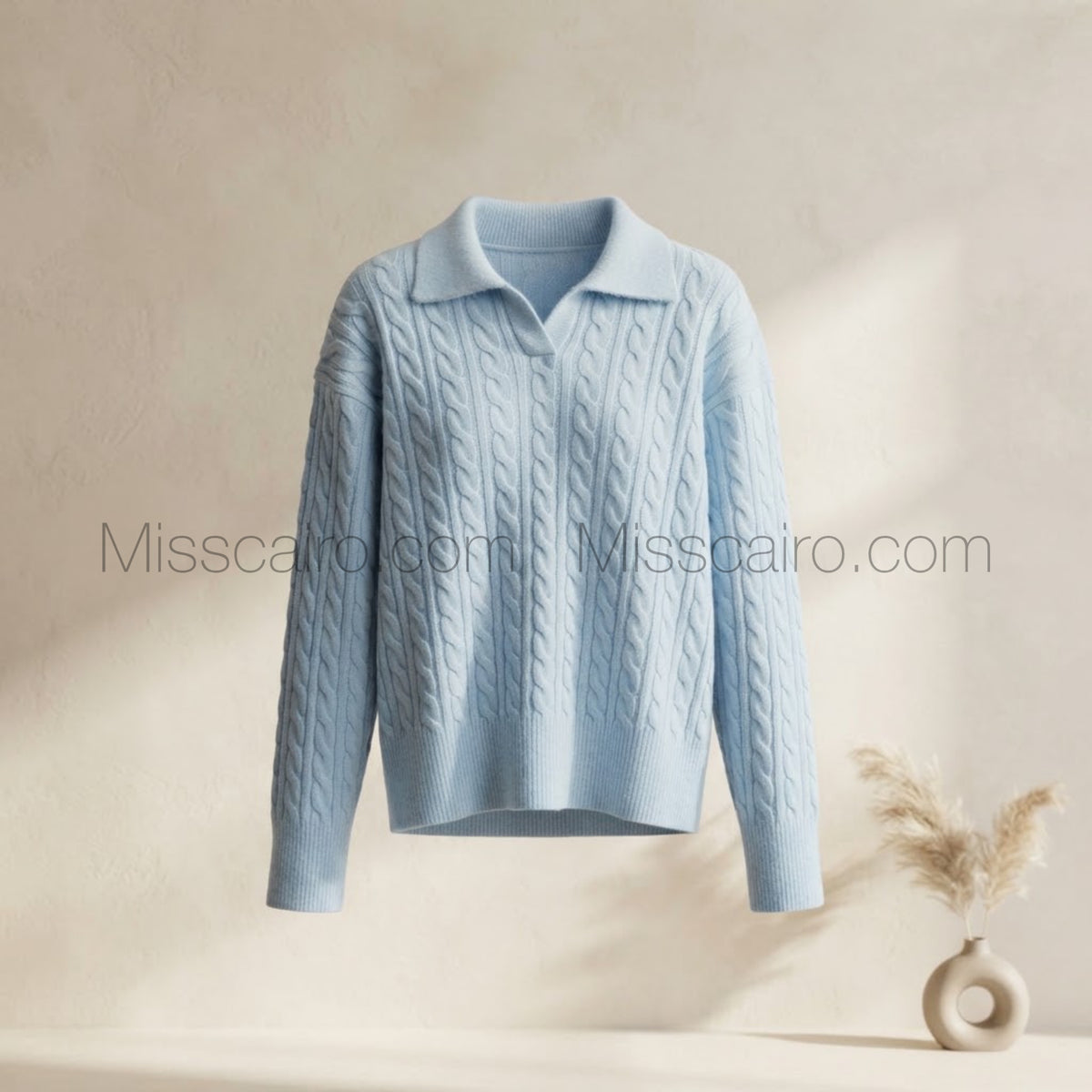 Stylish knit polo sweater.