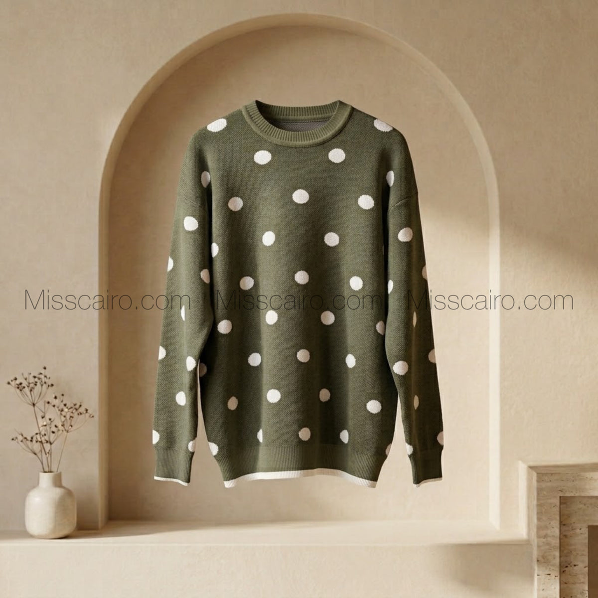 Cozy polka dot knitted sweater.