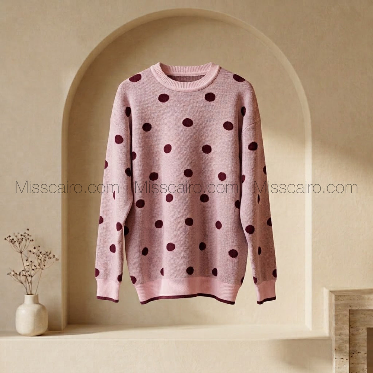 Cozy polka dot knitted sweater.